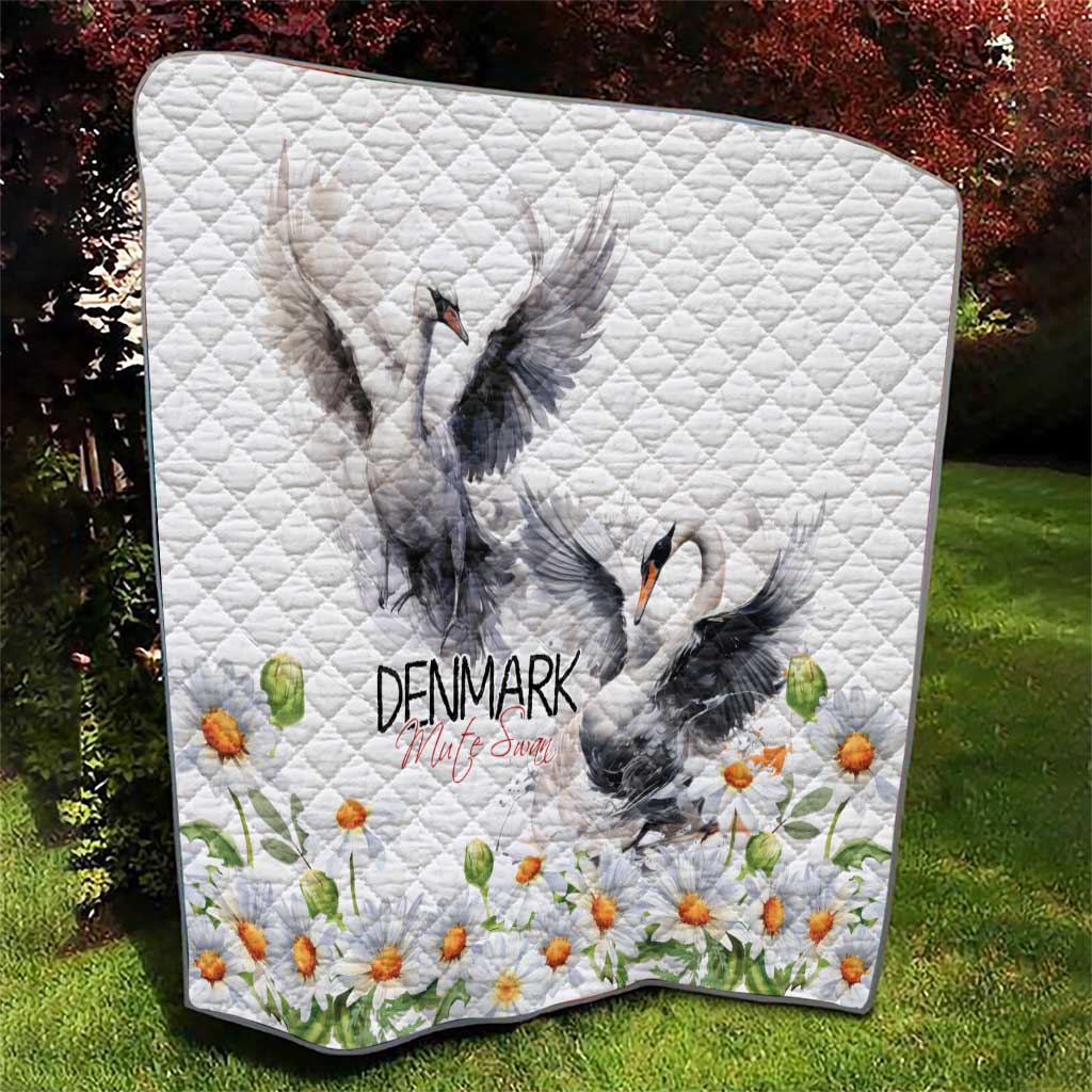 White quilt with gray mute swan, chamomile daisies along the bottom; diamond quilted