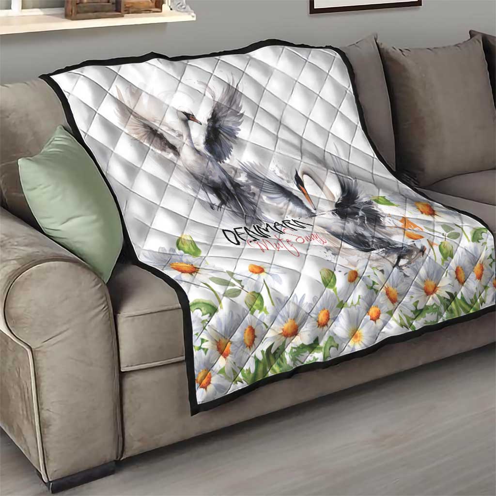 White quilt with gray mute swan and chamomile daisies; diamond quilting with Denmark text