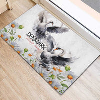 Mute swan rubber doormat with gray swans, chamomile daisies, and Denmark Mute Swan logo