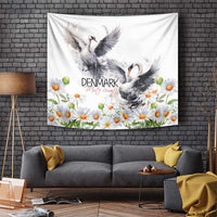 White wall tapestry with two grey swans, chamomile daisies, and “DENMARK” lettering