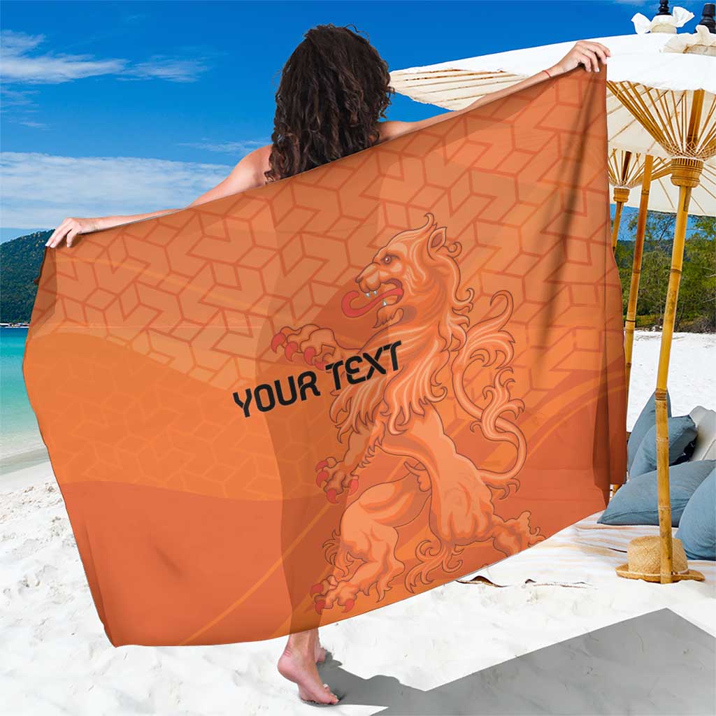 Orange custom football sarong with lion graphic and “YOUR TEXT” in the center