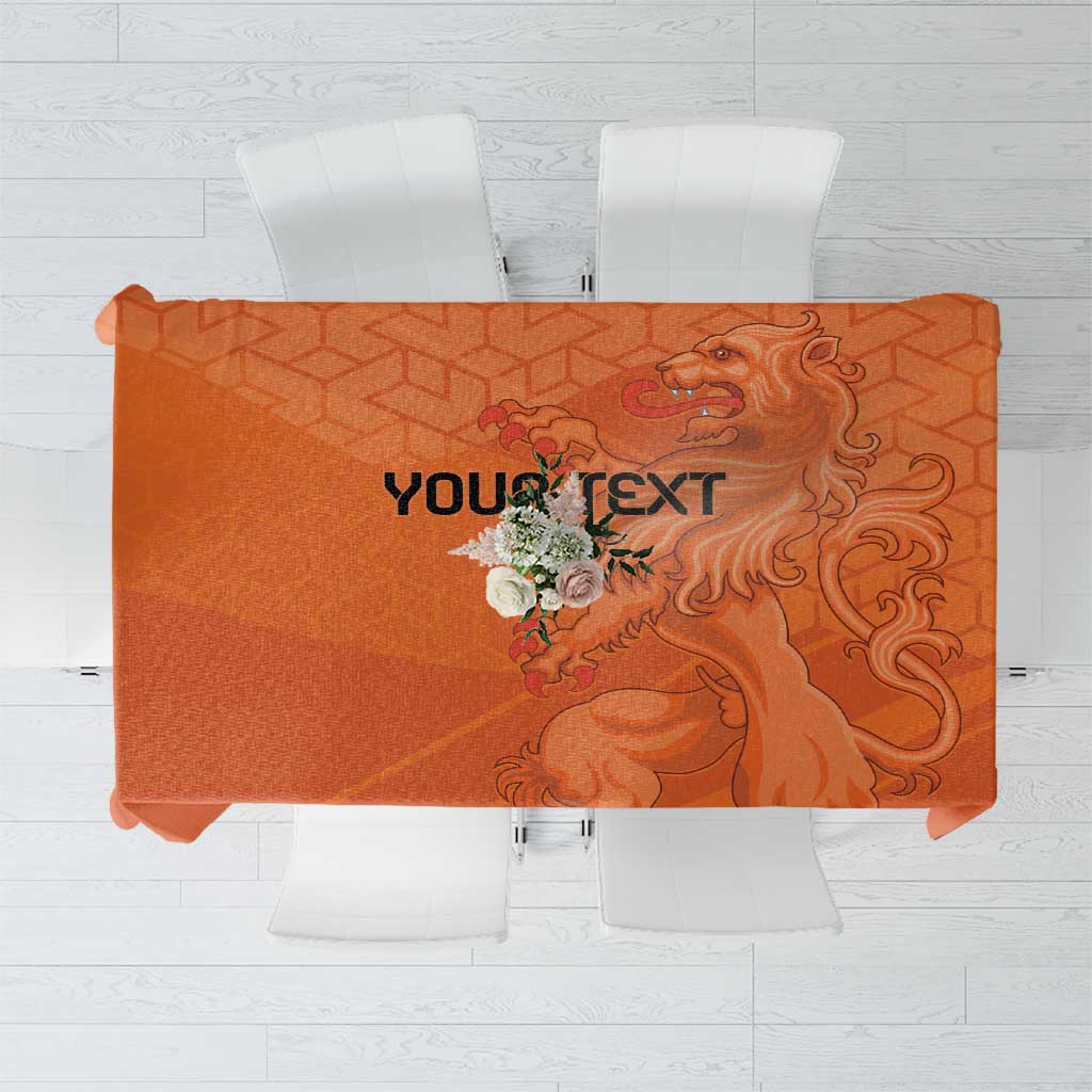 Orange football tablecloth with roaring lion and 'YOUR TEXT' center graphic