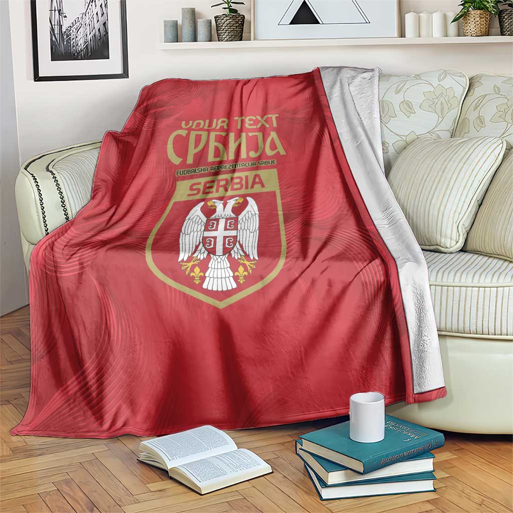 Red Serbia football blanket over a sofa with SERBIA and crest emblem