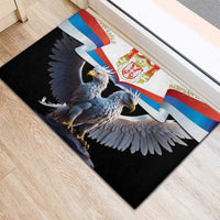 Black rubber doormat close view with Serbia flag, crest, and double-headed eagle