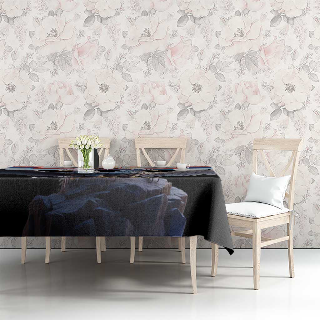 Black tablecloth with eagle and crest design, styled on dining table