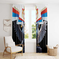 Black window curtain pair with Serbian eagle and flag graphic, hanging in living room