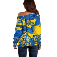 Women’s off-shoulder sweater, blue-and-yellow back graphic, long sleeves and fitted cuffs