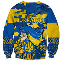 Unisex blue and yellow sweatshirt with camo background and Glory to Ukraine back graphic