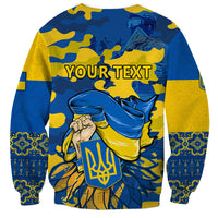 Blue and yellow unisex sweatshirt with camo graphic, trident emblem, and 'YOUR TEXT'