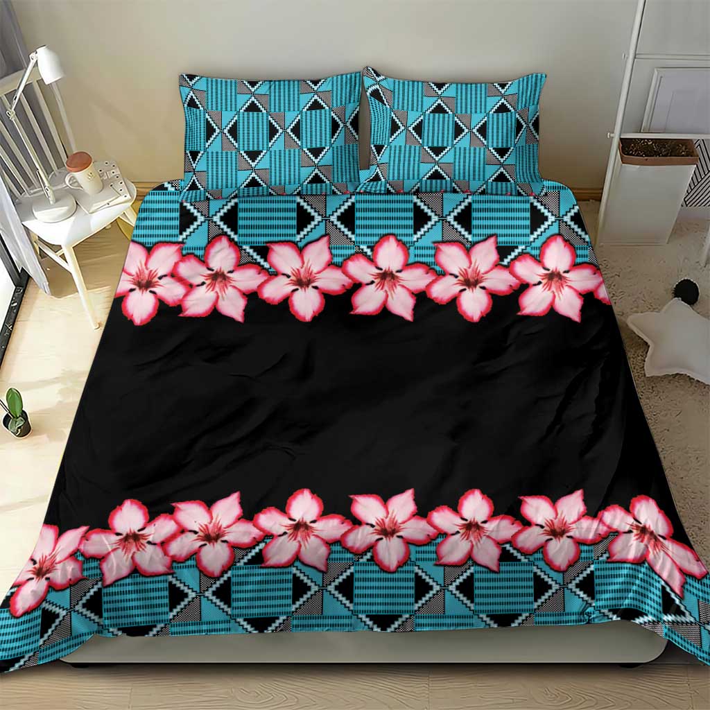 Black bedding set with turquoise geometric border and pink hibiscus floral stripe