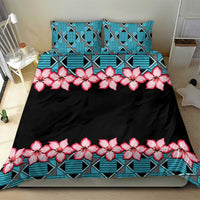 Black bedding set with turquoise geometric border and pink hibiscus floral stripe