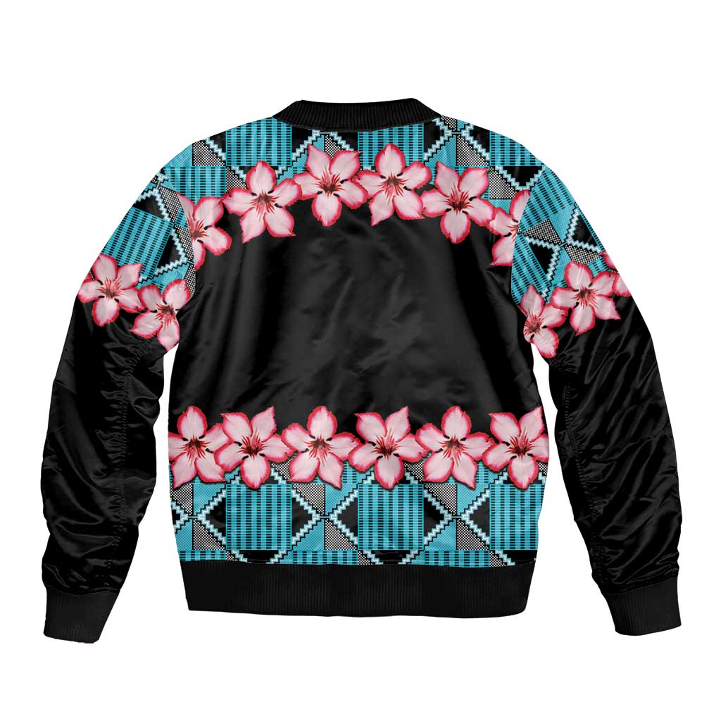 Unisex bomber jacket back view, black satin with blue geometric bands and pink hibiscus flowers