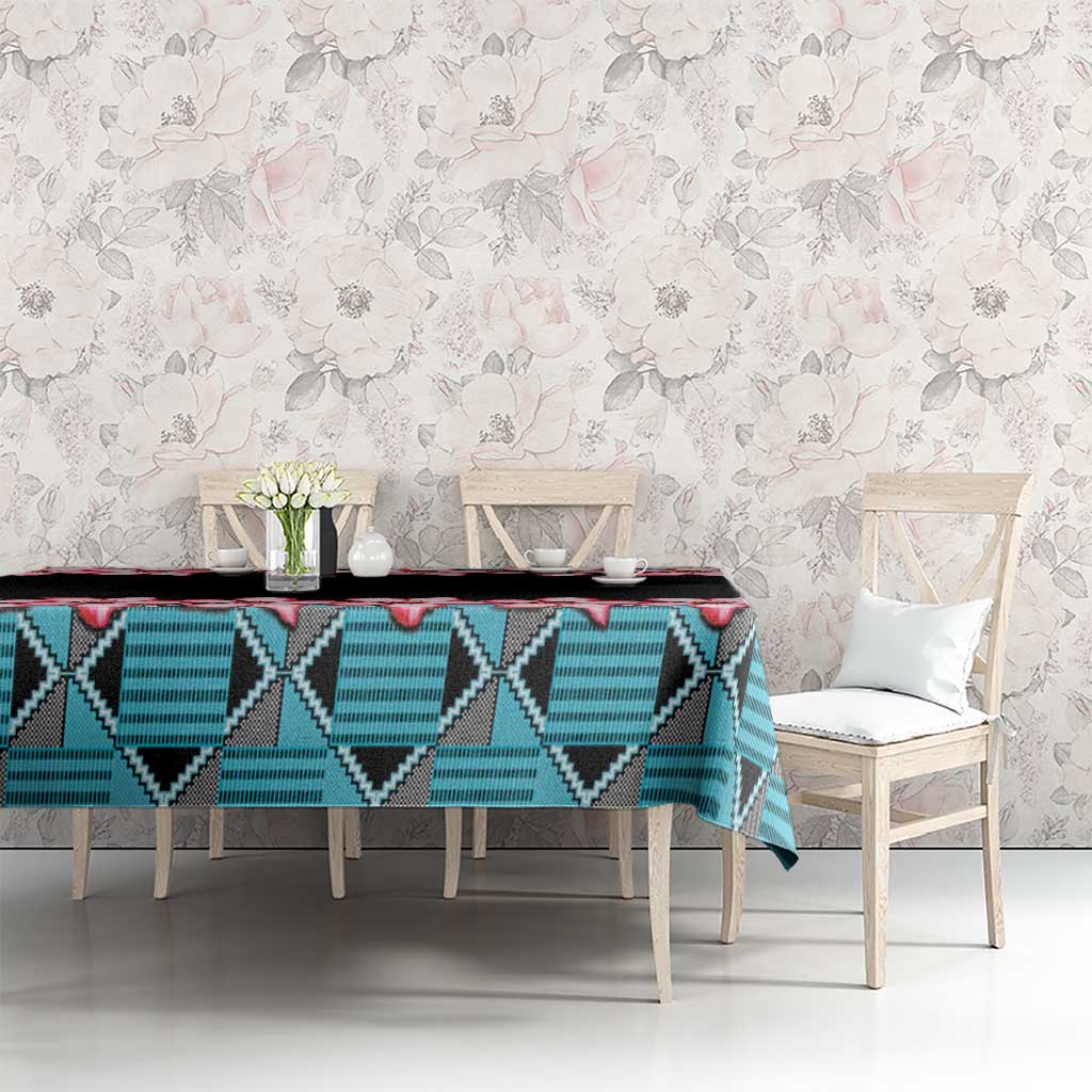 Tablecloth with black fabric and red hibiscus flowers plus blue zigzag geometric panel