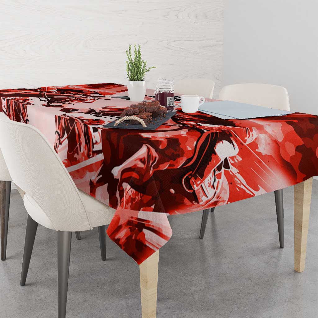 Red horse pattern tablecloth on dining table with plates and chairs
