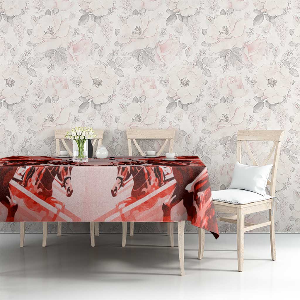 Red horse race tablecloth on dining table with chairs against floral wall