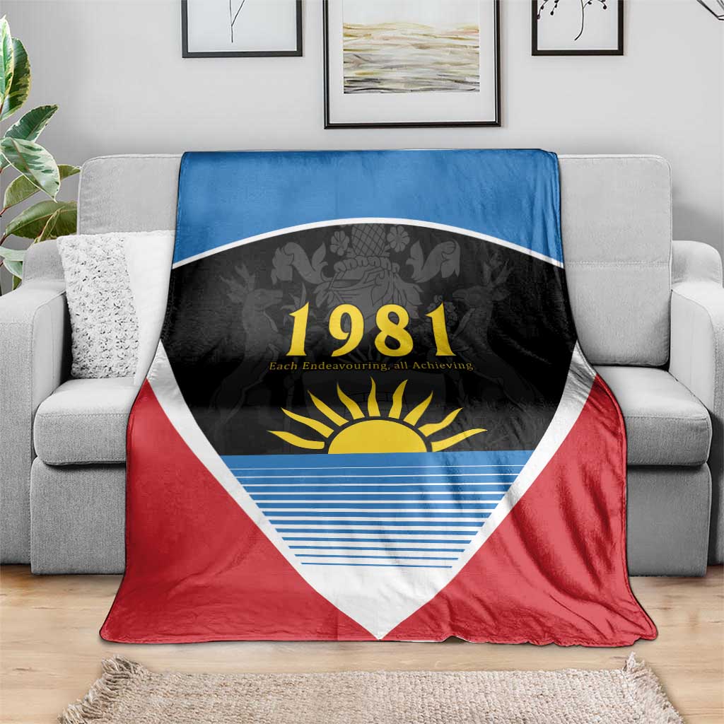 Flag blanket on sofa with red bottom, blue top band, white triangle border, 1981 sun