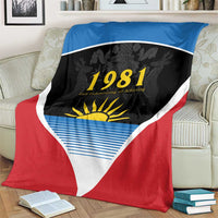 Flag blanket shown on couch with red base, blue top, white triangle edge, 1981 sun