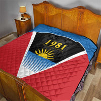 Antigua and Barbuda 1981 quilt on a bed, red and blue flag triangle with yellow sun