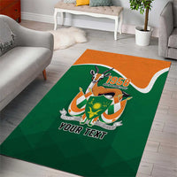 Green and orange area rug featuring a crest with “1958” and “YOUR TEXT”