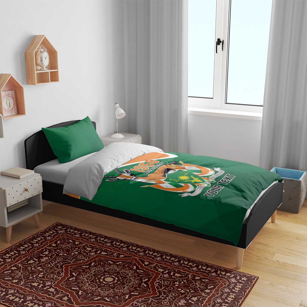Green and orange bedding set with matching pillow covers and 1958 emblem on duvet