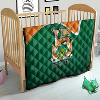 Green quilted baby throw quilt with orange top, crest emblem and 'YOUR TEXT'