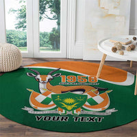 Personalized round green carpet with 1958 emblem, orange band, and YOUR TEXT