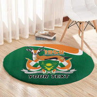 Personalized round green carpet with 1958 emblem and YOUR TEXT on floor