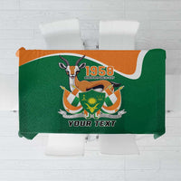 Green personalized tablecloth with crest, “1958” and “YOUR TEXT” print