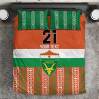 Orange, green, and white custom bedding set with number 21, YOUR TEXT, and Niger emblem