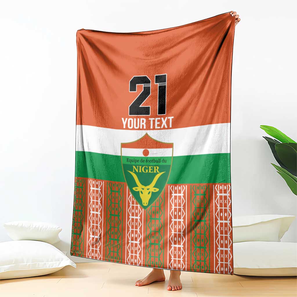 Orange football blanket with white band and green Niger crest, custom text and number 21
