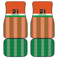 Set of custom car floor mats: orange patterned fronts and green patterned backs, black trim