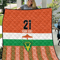 Custom football quilt with orange, white, and green Niger flag design and number 21