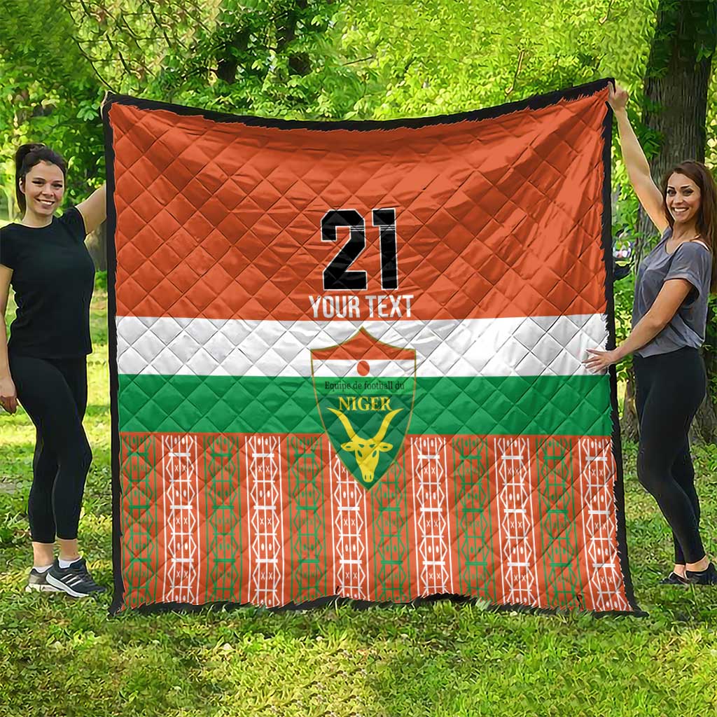 Orange custom quilt featuring Niger flag stripes, number 21, and patterned red-green border