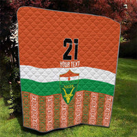 Orange custom football quilt with Niger flag bands, number 21, and green-red bottom pattern