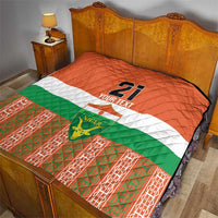 Custom football quilt with Niger flag colors, number 21, and quilted diamond texture