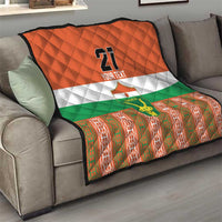 Orange custom quilt with Niger flag stripes, number 21, and red-green patterned lower panel