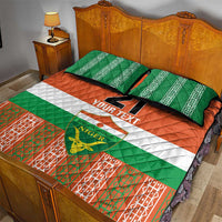 Orange and green quilt bed set with Niger flag stripe and soccer graphic, includes two pillows