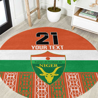 Orange round custom football carpet with '21 YOUR TEXT' and Niger crest shield