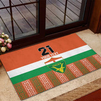 Orange rubber doormat on entry step with 21 and Your Text, Niger flag stripes and crest