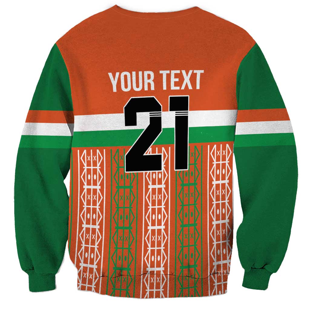 Back of orange and green custom sweatshirt with large number 21 and 'YOUR TEXT'