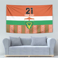 Orange flag tapestry with '21' text, Niger crest, white and green stripes.