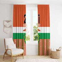 Custom window curtain panels, orange/white/green Niger design with number 21 and crest.