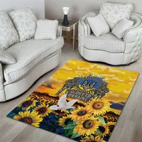 Yellow sunflower area rug with blue emblem and soldier text graphic, decorative floral border