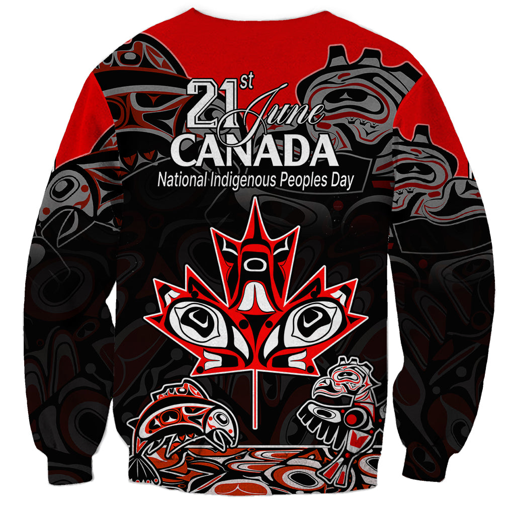 Red crewneck sweatshirt with black Indigenous art, 24 June and Canada print