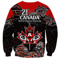 Red crewneck sweatshirt with black Indigenous art, 24 June and Canada print