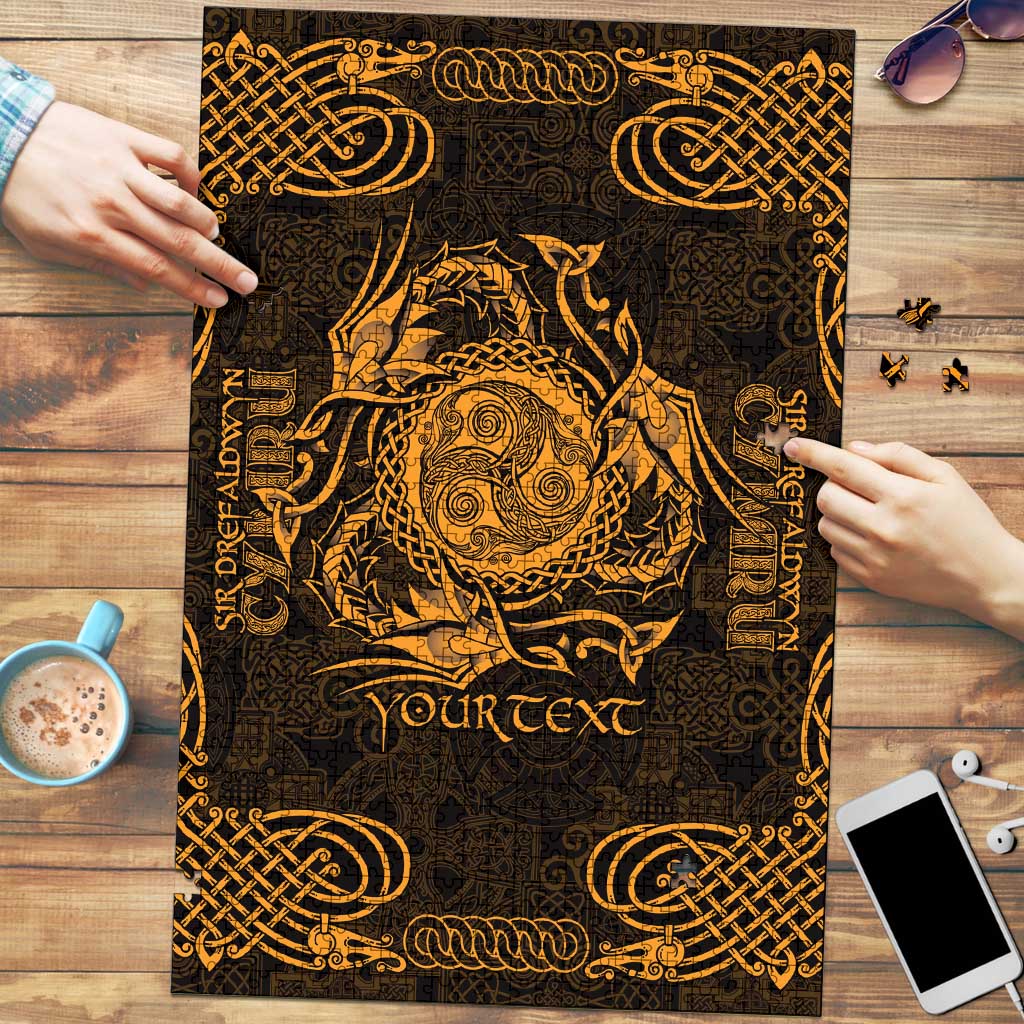 Gold Celtic jigsaw puzzle with black background and ornate triskele knotwork design