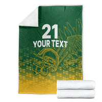 Custom cricket blanket folded with dark green and gold “21 YOUR TEXT” and cricket bat graphic.