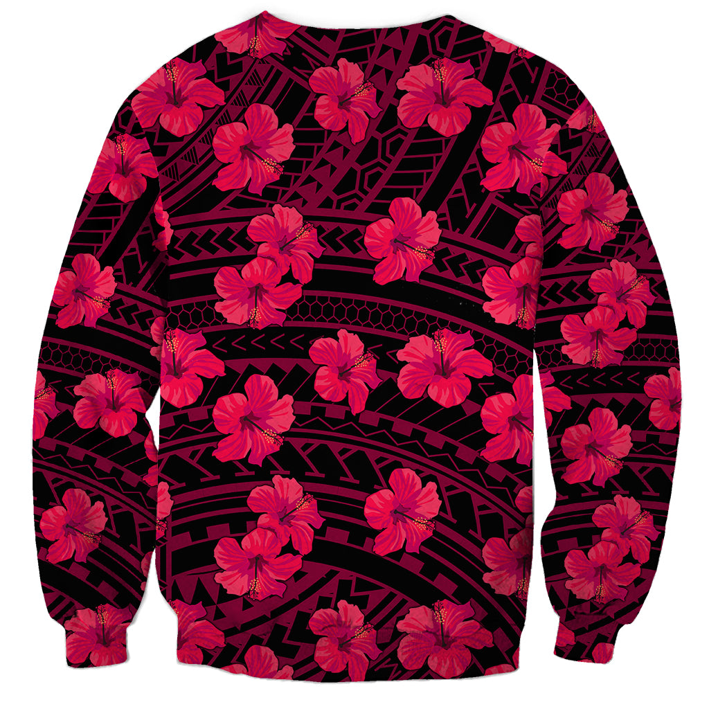 Unisex crewneck sweatshirt with pink hibiscus flowers over a dark geometric print