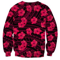 Unisex crewneck sweatshirt with pink hibiscus flowers over a dark geometric print