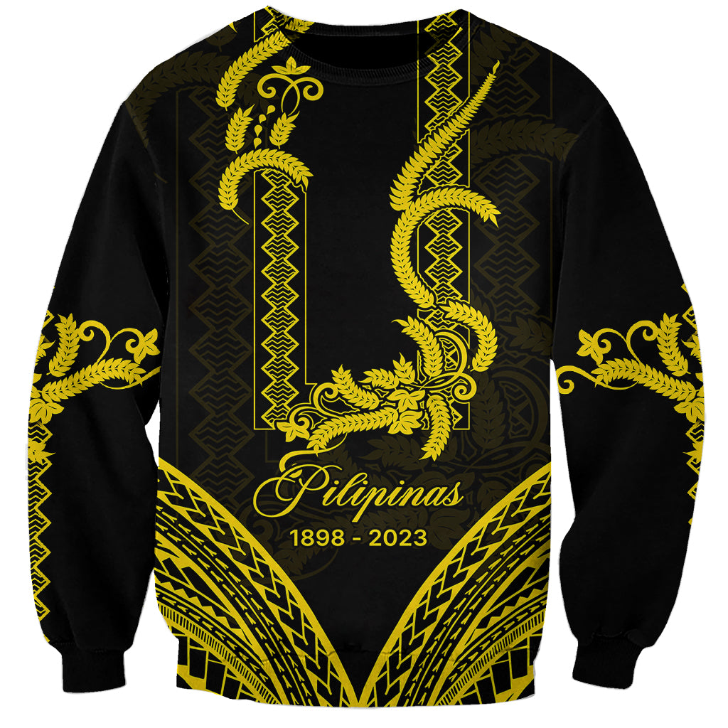 Black sweatshirt with gold barong-style patterns and front text 'Pilipinas 1898–2023'